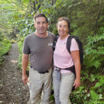 couple smiling on hike