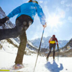 Low angle of two female skiers