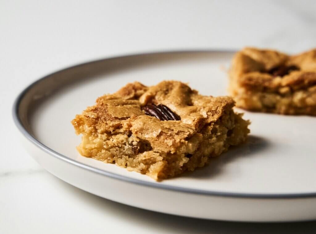 blondie bars arranged on a white plate healthy summer recipes
